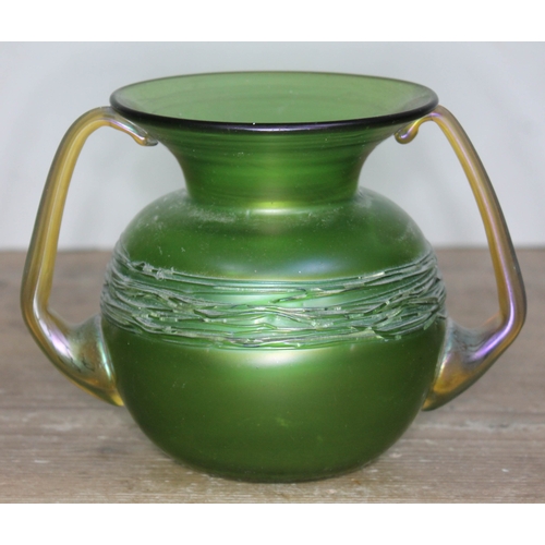 333 - An Austrian Art Nouveau Loetz Ausfuehrungen 44 iridescent and trailed green glass vase with flared r... 