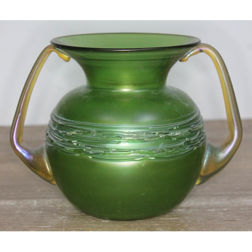 333 - An Austrian Art Nouveau Loetz Ausfuehrungen 44 iridescent and trailed green glass vase with flared r... 