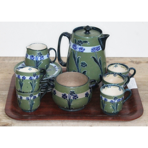 334 - A late Victorian Florian ware tea service, designed by William Moorcroft for Macintyre, comprising t... 