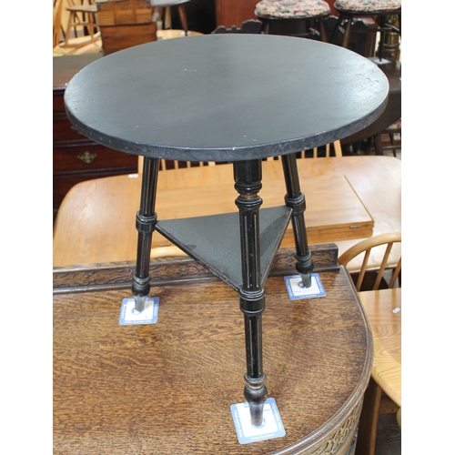 63 - A Victorian parcel gilt and ebonised gypsy style table, labelled 'From T.H. Filmer & Sons...', heigh... 