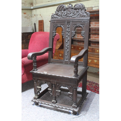 65 - A 17th century style joined wood chair.