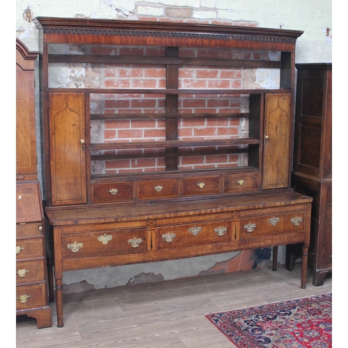 67 - A Georgian inlaid oak and mahogany dresser, width 214cm, depth 52cm & height 216cm.