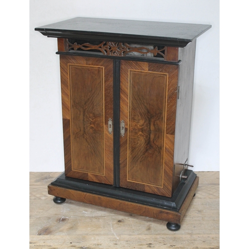 74 - A late 19th century table cabinet polyphon music player, 'The Imperial',with one disc, width 43cm, d... 