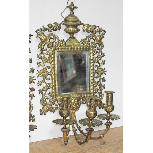 75 - A pair of 19th century gilt bronze girandole mirrors and sconces, length 55cm, width 29cm.