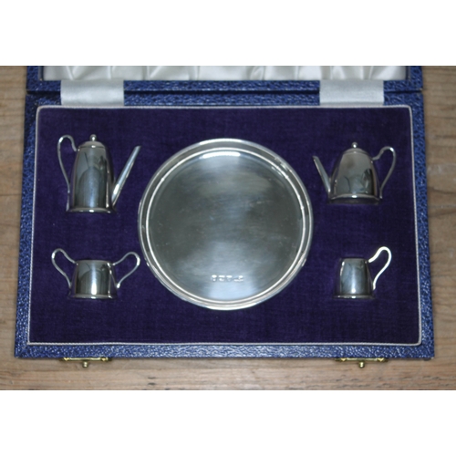 97 - A cased miniature silver tea service, Mappin & Webb, Birmingham 1979.