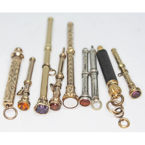 99 - A group of ten miniature propelling pencils including one hallmarked silver, gold plated etc.