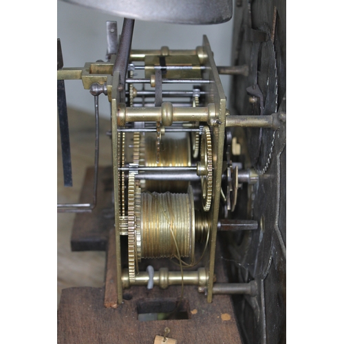 23 - An 18th century Cumbrian single finger long case clock movement and dial, four pillar, striking on s... 