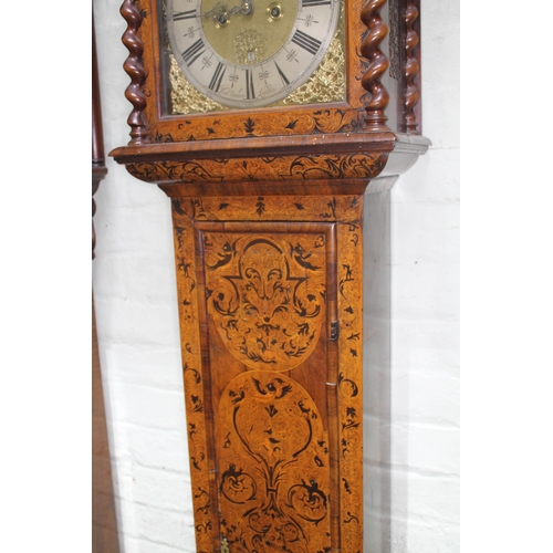 25 - A William & Mary/Queen Anne eight day long case clock, arabesque marquetry inlaid case, the hood wit... 