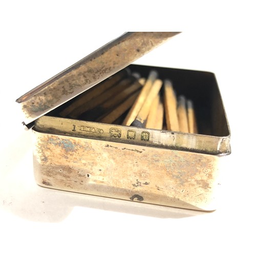 92 - A mixed lot of hallmarked silver comprising an Art Deco match striker, a Samson Mordan & Co matchbox... 