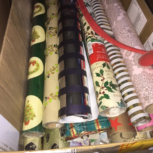 157 - A box of wrapping paper rolls.