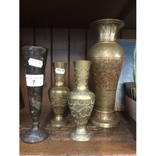 7 - A quantity of eastern brass vases