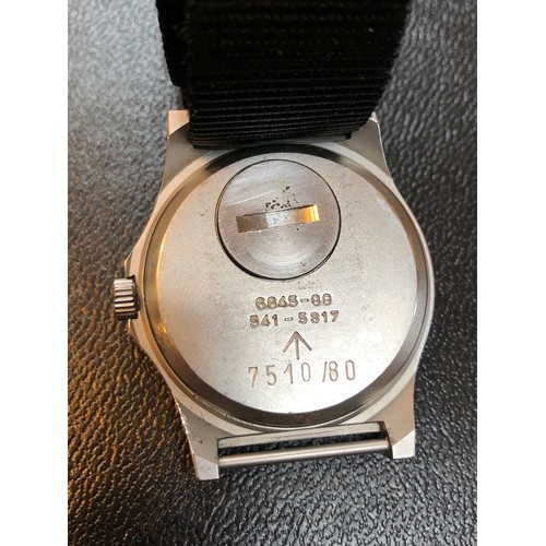 104 - A 1980 Precista British Royal Navy issue stainless steel quartz wristwatch, the signed black dial ha... 