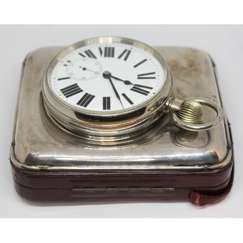 127 - An oversized chrome plated pocket watch in hallmarked silver travel case, watch diam 64mm, case 11cm... 