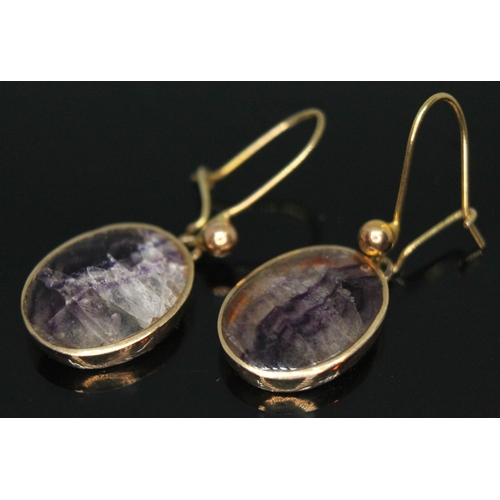 145 - A pair of hallmarked 9ct gold fluorite cabochon earrings, length (including loop) 30mm, gross wt. 3.... 