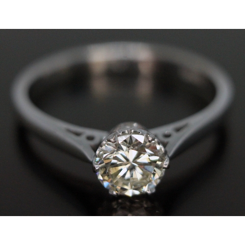 178 - A diamond solitaire ring, the round brilliant cut stone weighing approx. 0.67 carats (estimated) in ... 