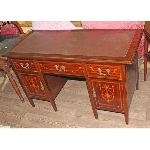 62 - An Edwardian inlaid mahogany desk, length 128cm, depth 55cm & height 74cm.