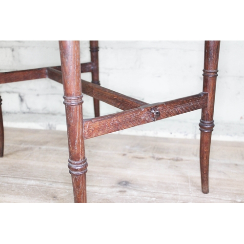 71 - A Victorian Aesthetic Movement oak occasional table, height 72.5cm.