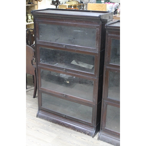 83 - An early 20th century oak sectional bookcase, width 87cm, depth 35.5cm & height 141.5cm.