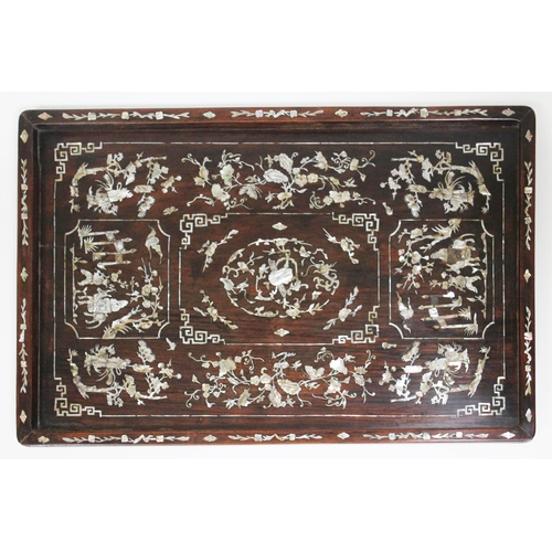 87 - A Chinese 19th century mother of pearl inlaid rosewood tray of rectangular form inlaid with figures,... 