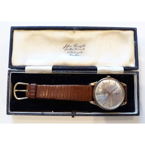 201 - A 1960s hallmarked 9ct gold Majex wristwatch with signed champagne dial, gold tone hour batons and d... 