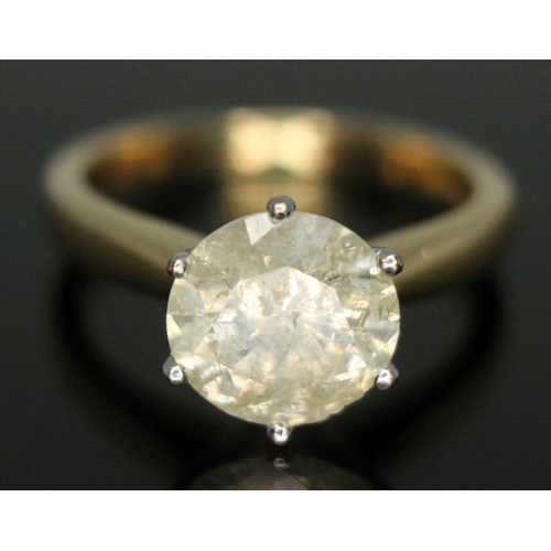 203 - A diamond solitaire ring, the stone weighing approx. 2.46ct, hallmarked 18ct gold band, gross wt. 4.... 