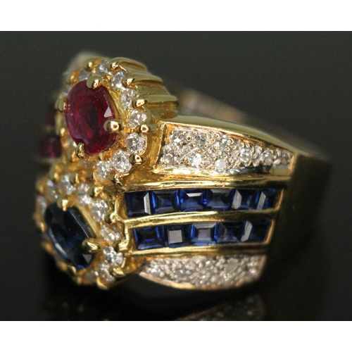 207 - A diamond, ruby and sapphire cluster ring, marked '14k', gross wt. 7.70g, size M.