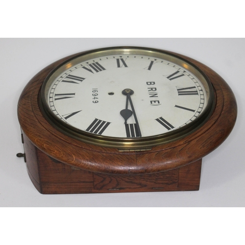 17 - An oak cased British Rail North Eastern Region wall clock, 12