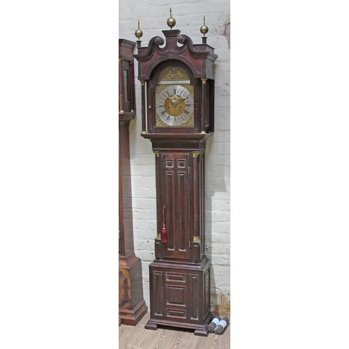 24 - A Georgian and later panelled and ebonised mahogany 8 day long case clock, broken swan neck pediment... 