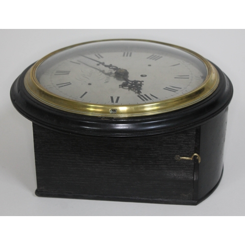 9 - An early 19th century ebonised wall clock, brass bezel with domed glass, 9