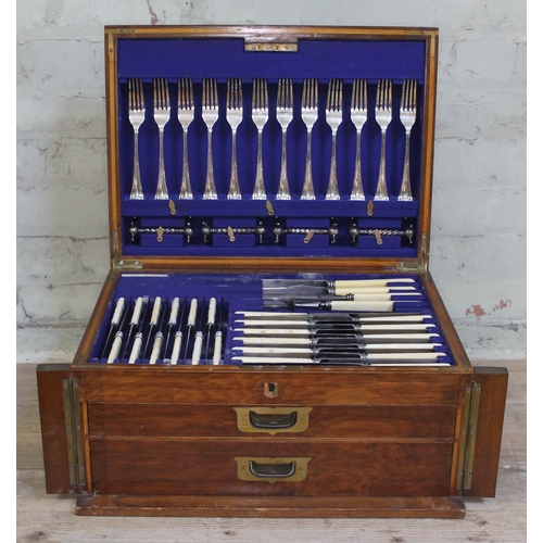 231 - An oak canteen containing a 12 place setting of silver plated cutlery with ivory handled knives, cam... 