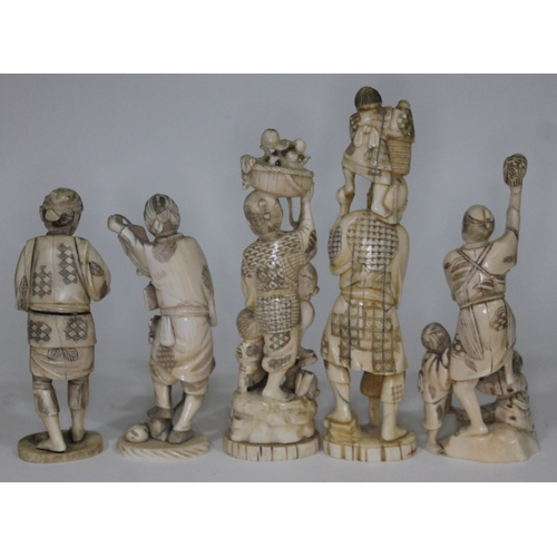 249 - A group of five Japanese Meiji period carved ivory okimono, heights ranging from 16cm to 22cm.