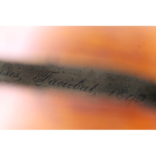 253 - A 19th century violin by Carlo Storioni, length of back 356mm, interior label dated 1890, with woode... 