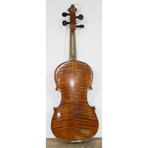 253 - A 19th century violin by Carlo Storioni, length of back 356mm, interior label dated 1890, with woode... 