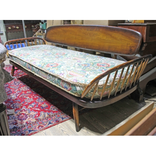 90A - An Ercol three seater studio day bed.