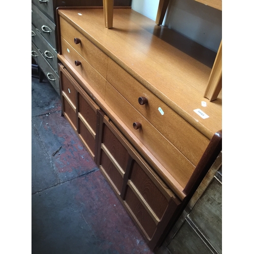 845 - A Nathan teak sideboard with two drawers above cupboard on solid base, H74cm W102cm, together with a... 