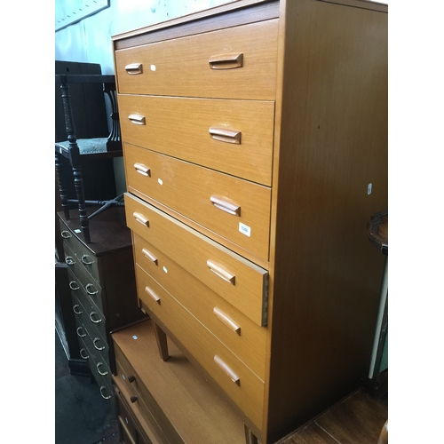 846 - A retro teak chest of drawers on tapered legs, H119cm.