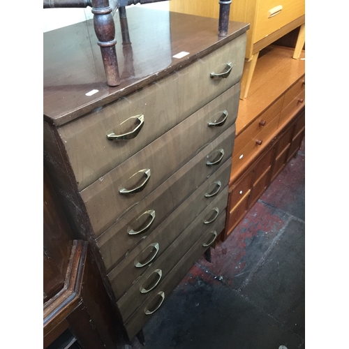 850 - A retro tall chest of drawers, on tapered legs, H113cm.