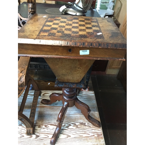 899 - A 19th century walnut pedestal  sewing table with chess top.