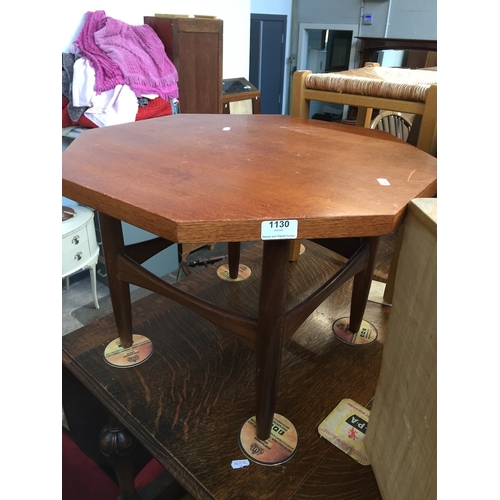 930 - Octagonal teak coffee table