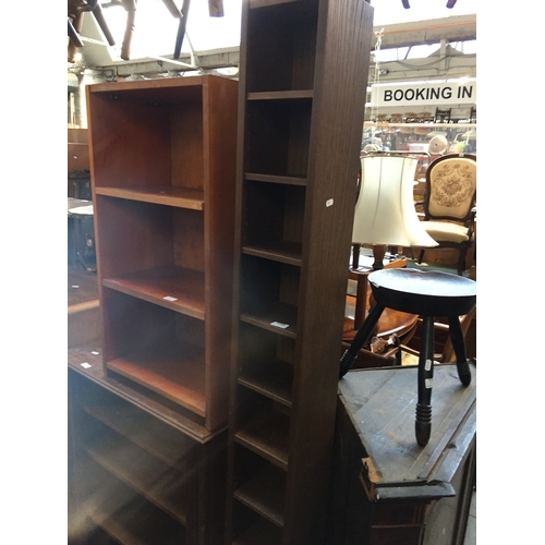 945 - A tall narrow cd case and small bookcase