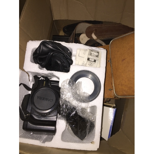 232 - A box of cameras and accessories, Brownie, Kodak 8mm cine camera, etc.