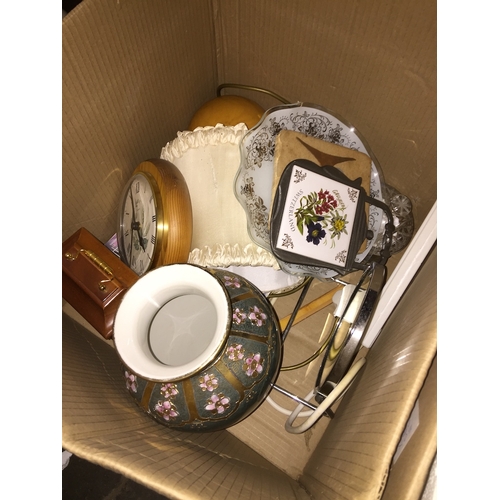 233 - A box of misc, pottery, 2 clocks, table lamp, bathroom mirror, multiple socket gang plug, etc.