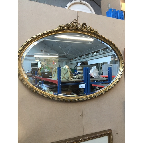 779 - Oval gilt framed mirror