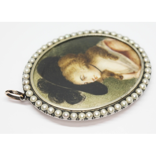 258 - An early 19th century portrait miniature on ivory, the white metal oval set with pearls, length 8cm.