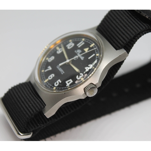 104 - A 1980 Precista British Royal Navy issue stainless steel quartz wristwatch, the signed black dial ha... 