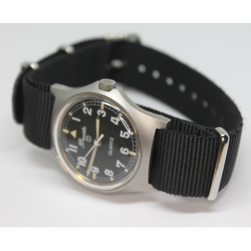 104 - A 1980 Precista British Royal Navy issue stainless steel quartz wristwatch, the signed black dial ha... 