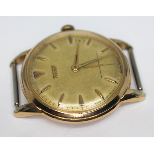 106 - A 1950s Tissot gold plated wristwatch having signed champagne dial with natural patina, gold tone ho... 