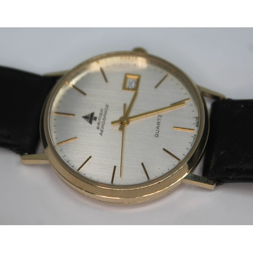 107 - A 9ct gold 1980s British Aerospace presentation quartz wristwatch having signed champagne dial, gold... 