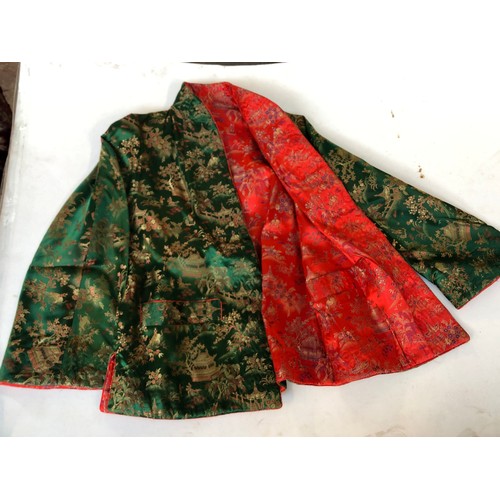 215 - Four traditional Chinese silk jackets.