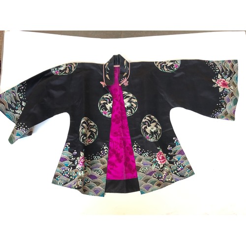 215 - Four traditional Chinese silk jackets.